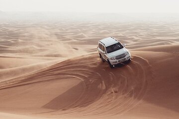 Dubai Dune Bashing, Sand Boarding and Camels with Barbeque