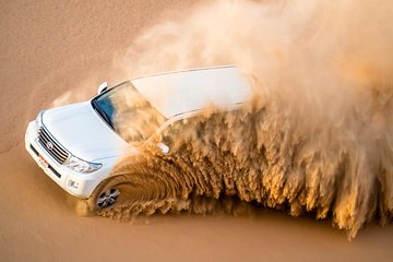 Dubai Evening Desert Quad Bike Adventure and barbecue Dinner