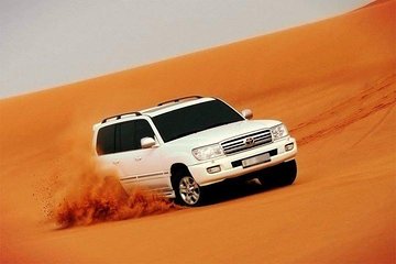 Dubai Desert Safari with BBQ Dinner & Live Shows