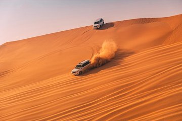 Arabian Desert Safari with Dinner, Camel Ride, Sandboarding
