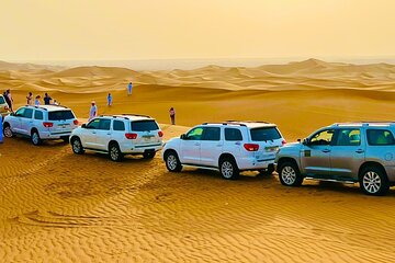 Afternoon Desert Safari with Quad Bike, Camel Ride and Sandboarding